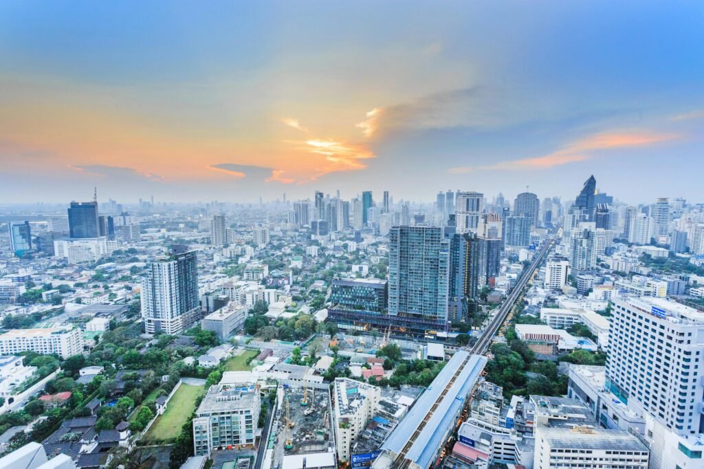 pexels-photo-1374377-1374377 Stunning aerial view of Bangkok cityscape during twilight, showcasing the city's modern skyline.