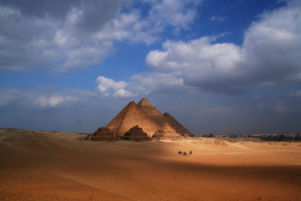 pexels-photo-3772630-3772630 Amazing view of sandy dunes in desert with Pyramid of Cheops in Egypt