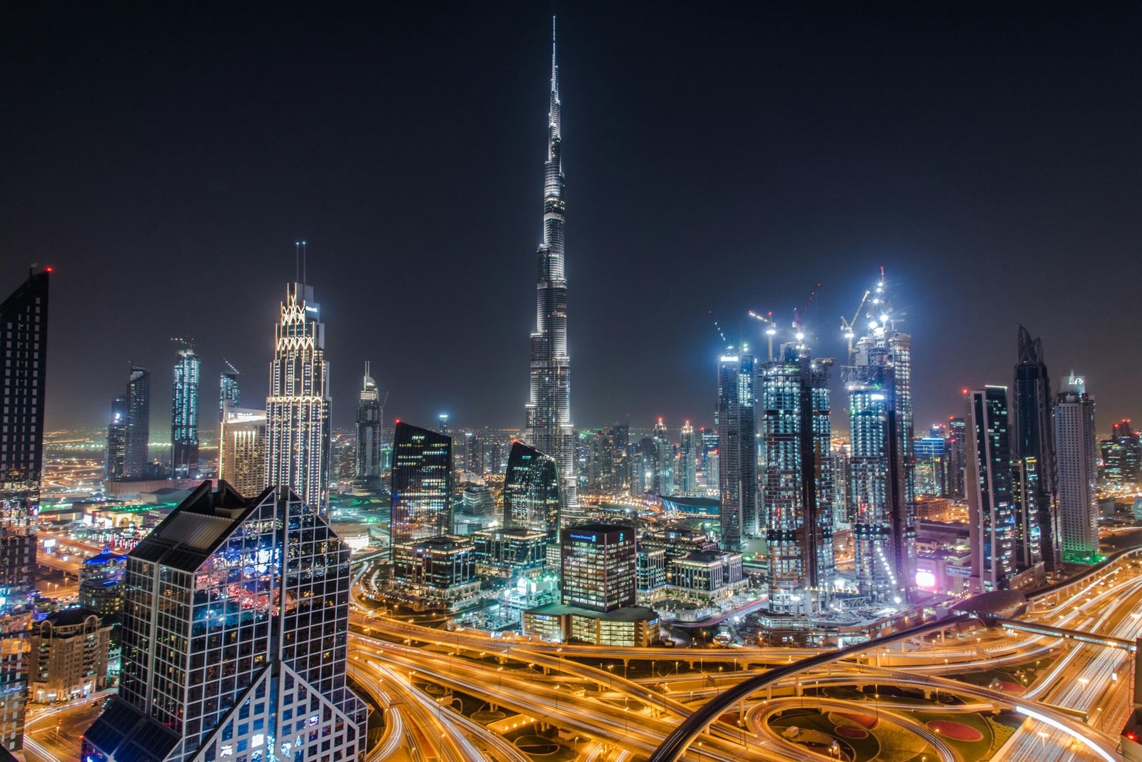 pexels-photo-3787839-3787839 A stunning view of Dubai's illuminated skyline featuring the towering Burj Khalifa at night.