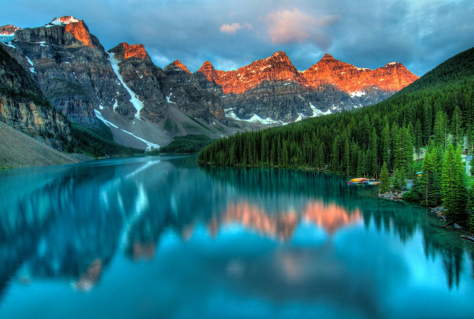 pexels-photo-417074-417074-1 Capture the serene beauty of Moraine Lake with sunrise reflections in Banff National Park.