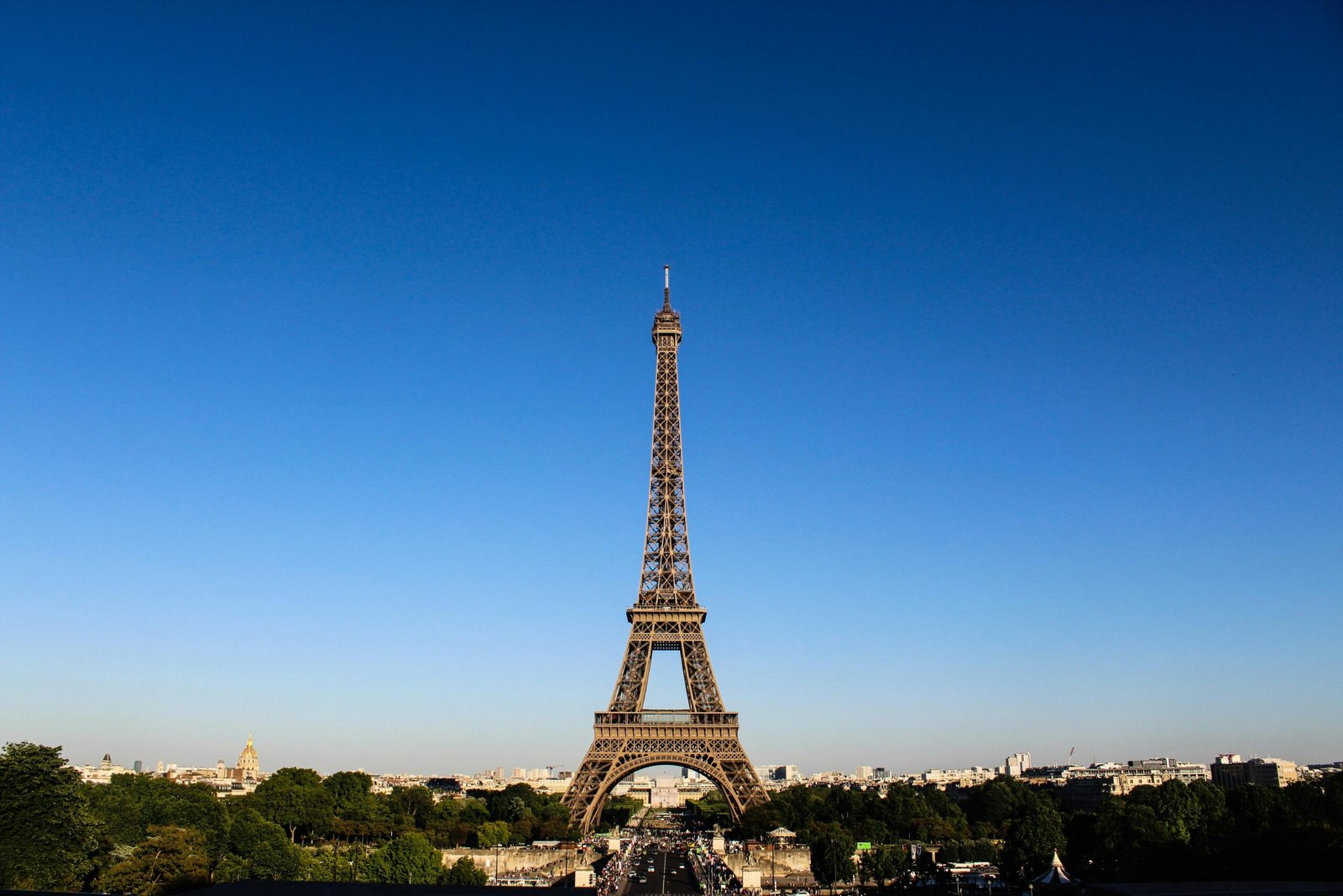 pexels-photo-532826-532826 Stunning daylight shot capturing the Eiffel Tower with clear blue skies in Paris.