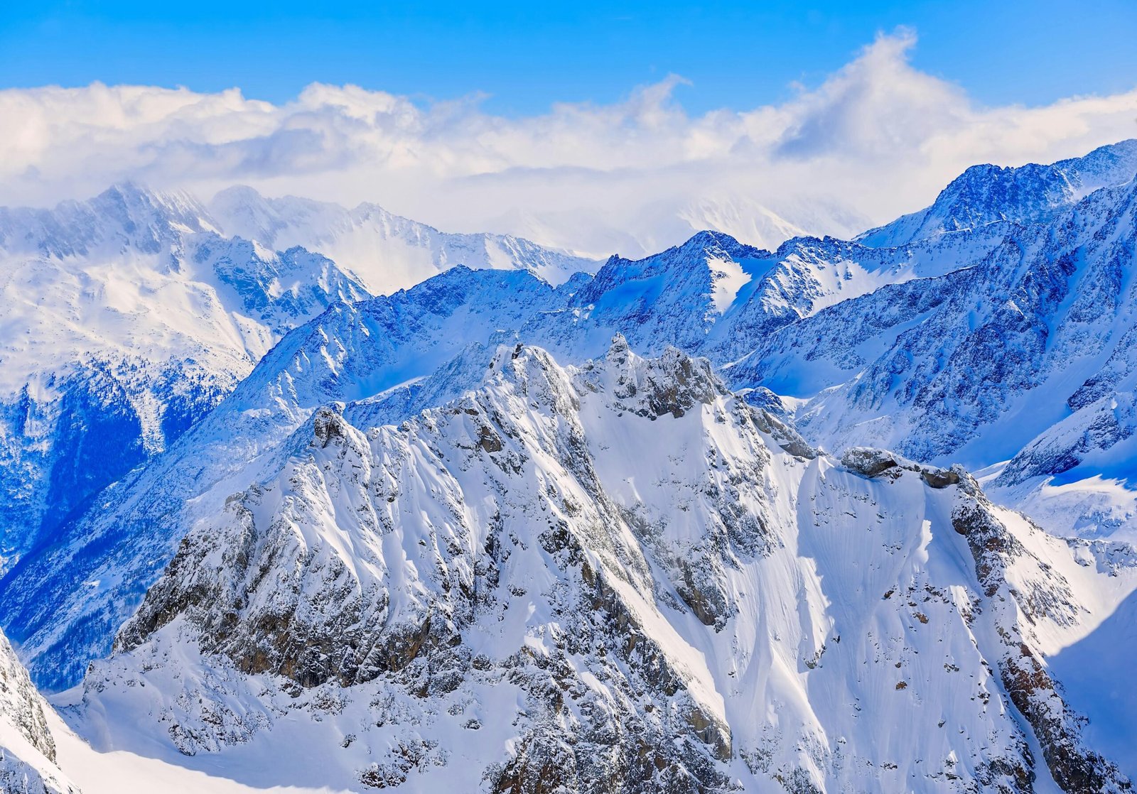 pexels-photo-714256-714256 Stunning view of snow-covered peaks in Engelberg, Switzerland. Perfect for winter adventures.