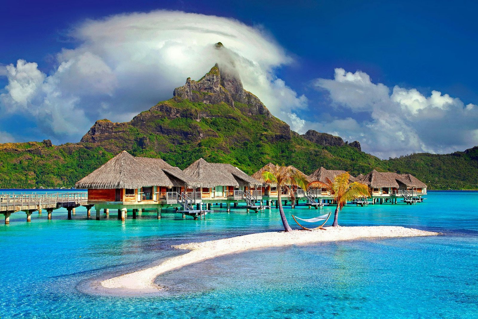 pexels-photo-753626-753626 Beautiful overwater bungalows and mountain in Bora Bora. Perfect tropical getaway.