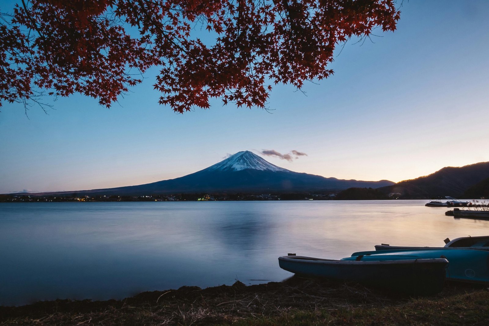 pexels-photo-1108701-1108701-1 Capture the beauty of Mount Fuji with vibrant autumn leaves at Lake Kawaguchi during twilight.