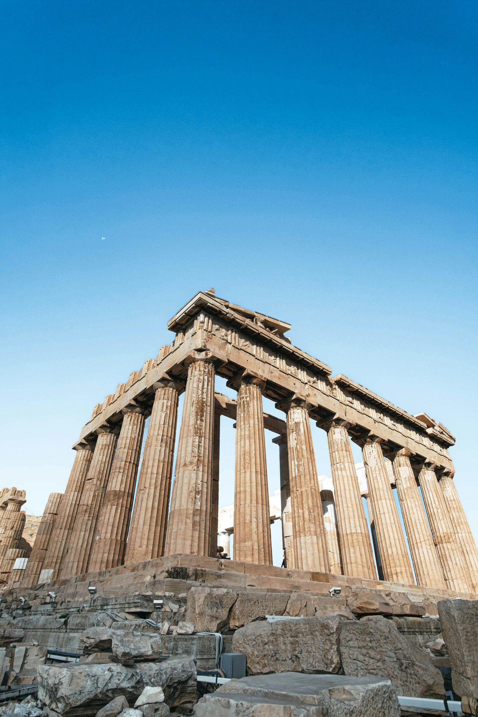 pexels-photo-14811125-14811125 Stunning low-angle shot of the Parthenon temple in Athens, Greece under a clear blue sky.