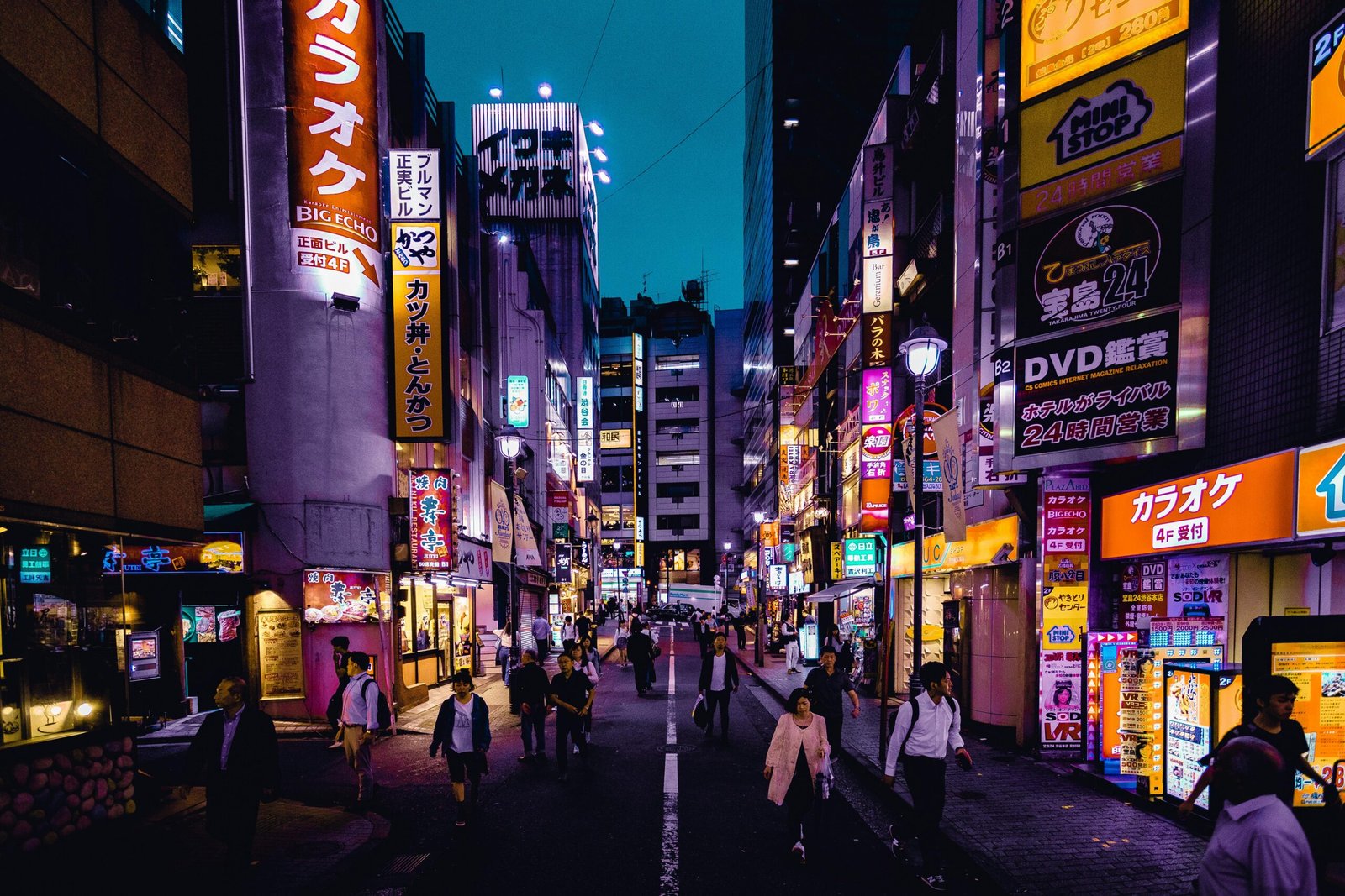 pexels-photo-1510595-1510595 Explore the lively streets of Shinjuku, Tokyo at night with colorful lights and bustling activity.