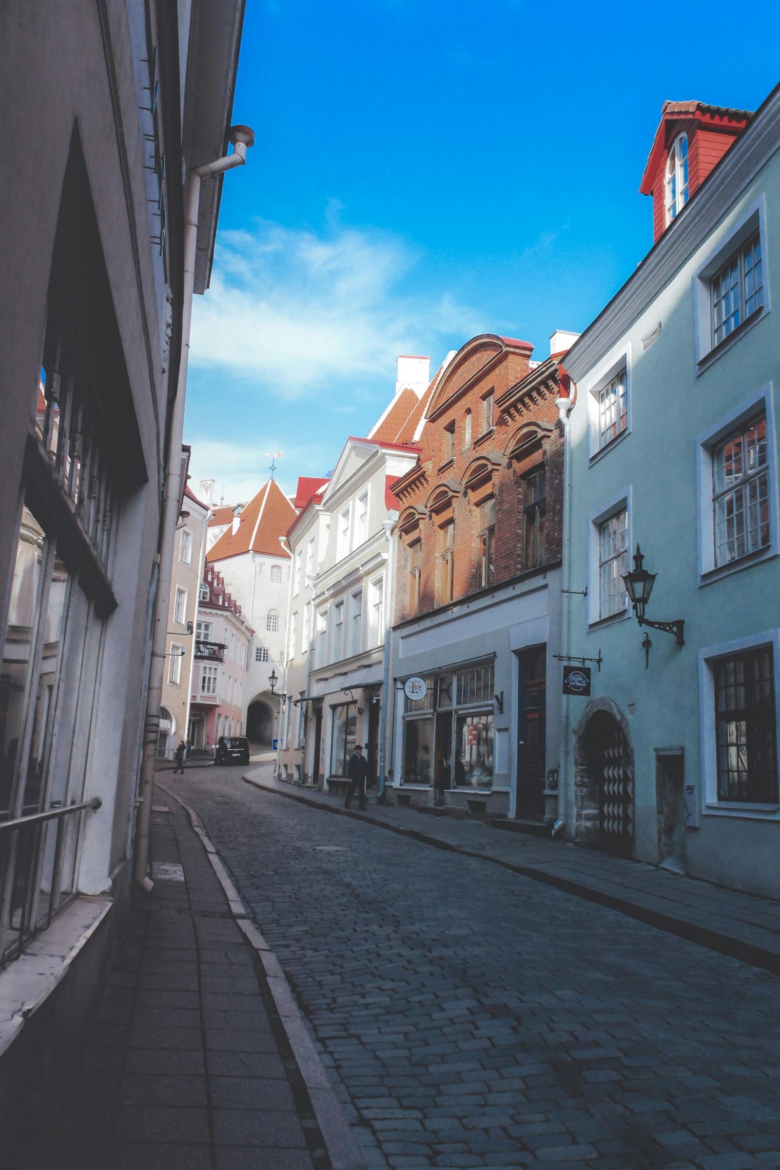 pexels-photo-1803860-1803860 Explore the cobblestone streets and historic buildings of Tallinn's Old Town on a sunny day.