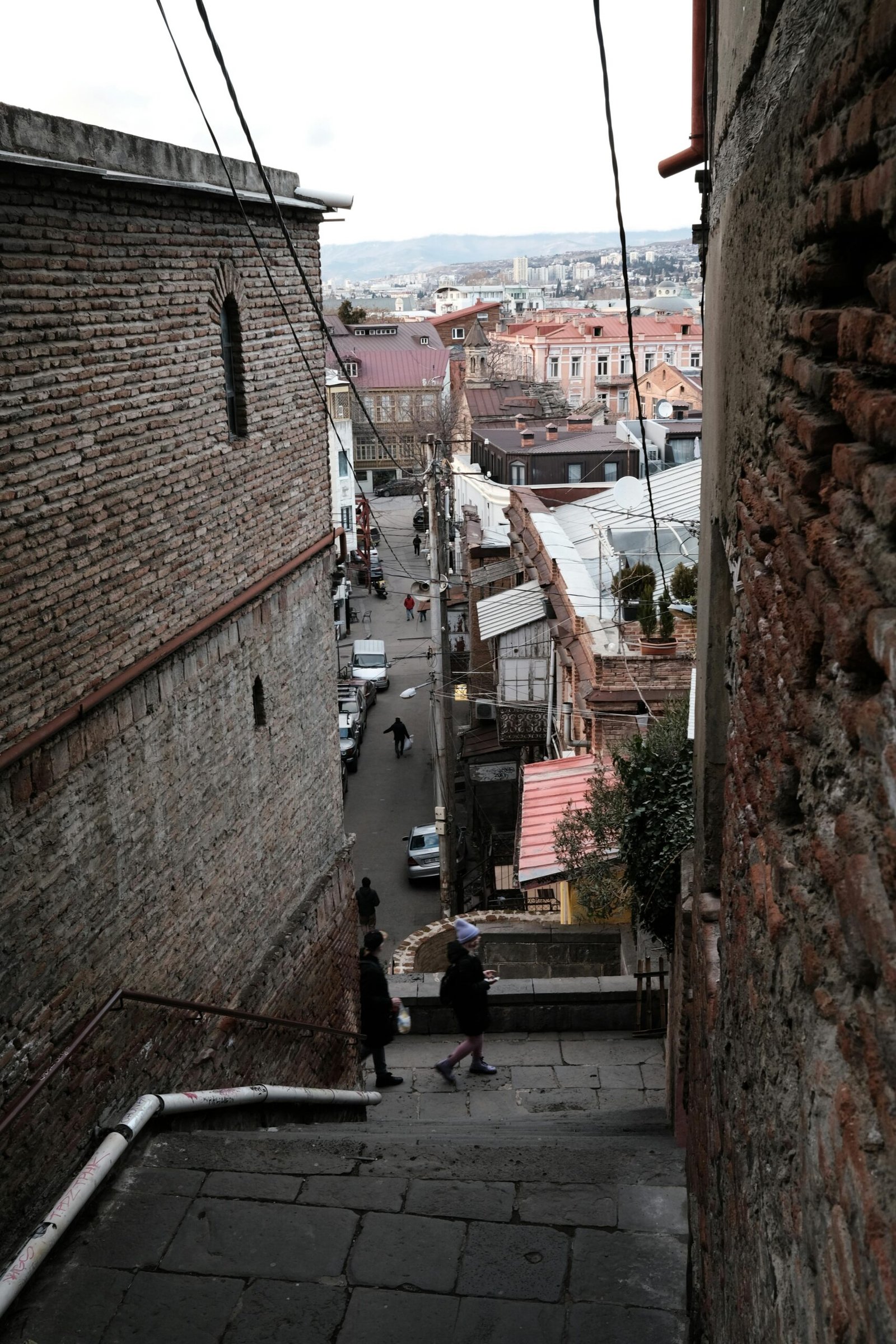 pexels-photo-18781306-18781306 Discover the quaint streets of Tbilisi's old town showcasing historic architecture and vibrant city life.