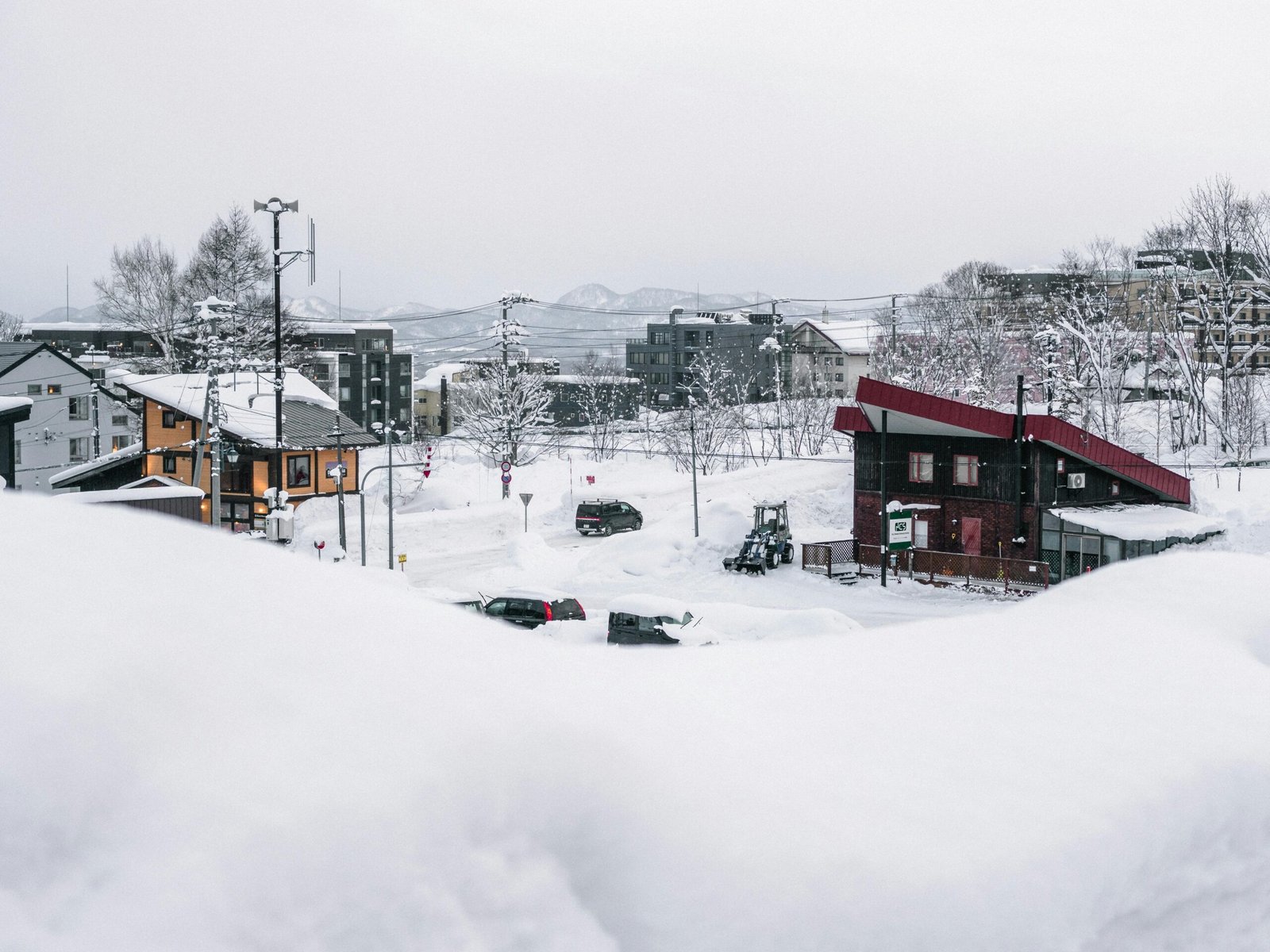 pexels-photo-2031689-2031689 A serene winter scene in snowy Niseko, Hokkaido, showcasing a tranquil village covered in snow.