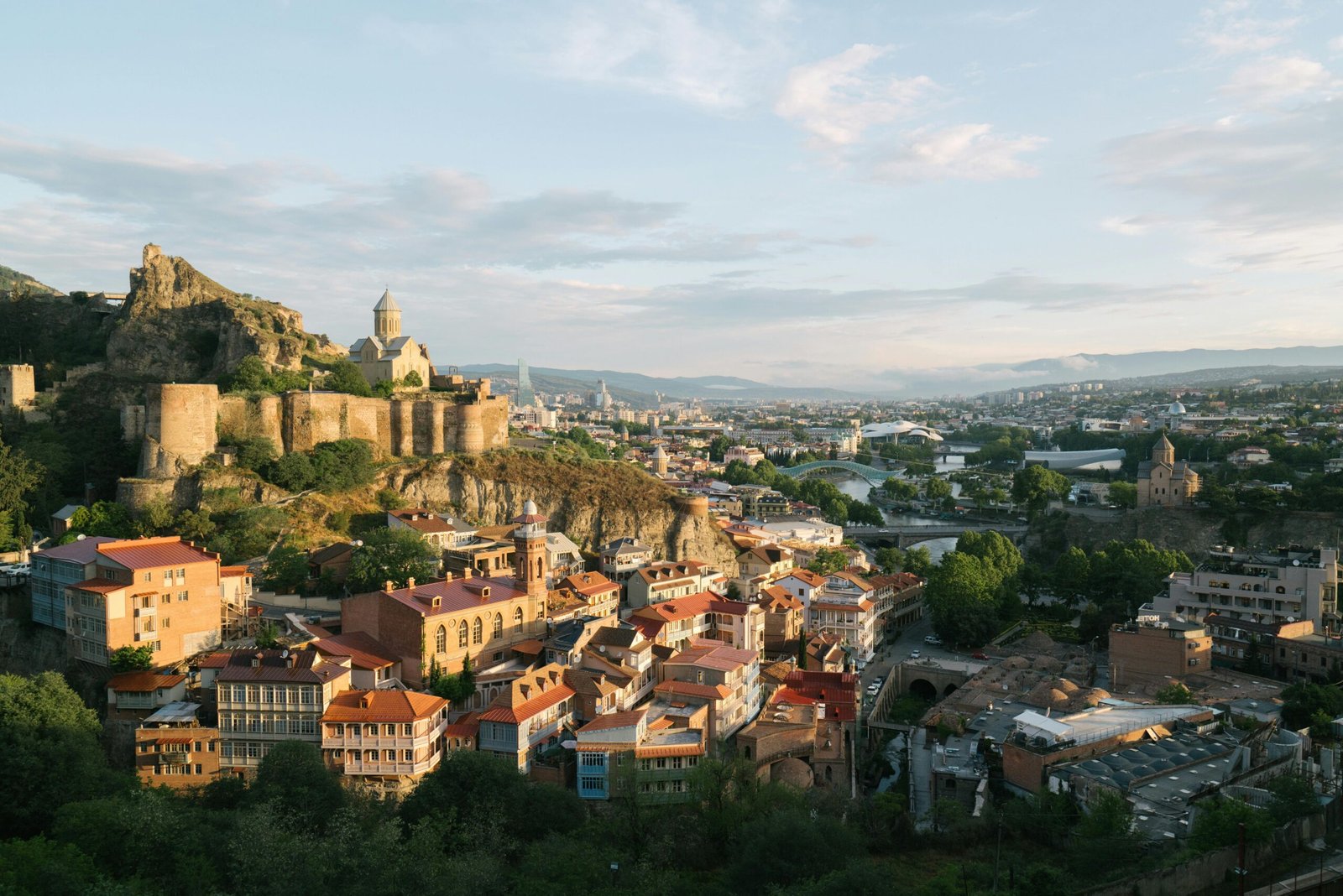 pexels-photo-4638265-4638265 Stunning aerial view of Tbilisi featuring the historic Narikala Fortress and charming cityscape.