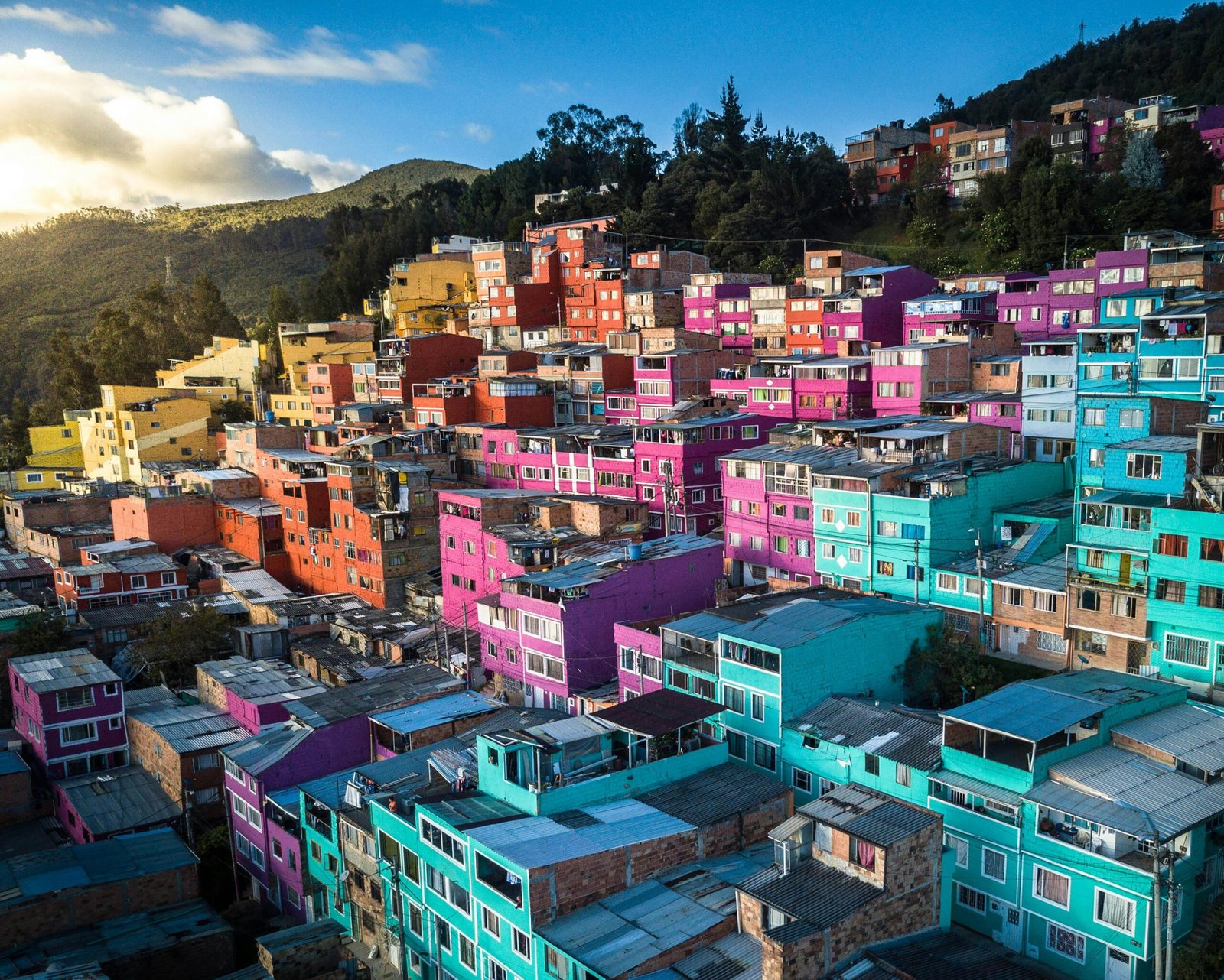 pexels-photo-8264573-8264573 Aerial view of vibrant, colorful houses on a hillside in Bogotá, Colombia.
