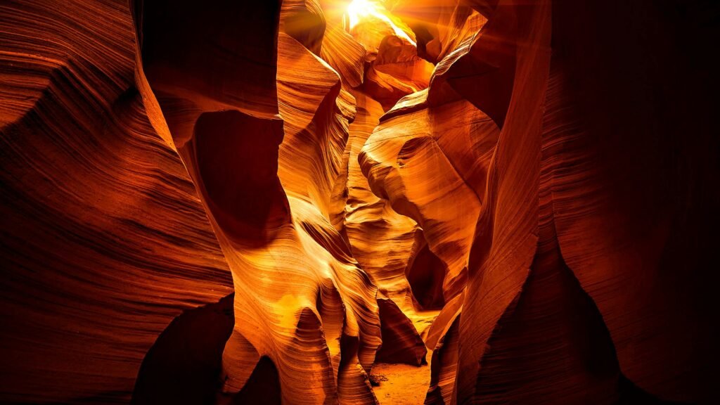 Stunning view of Antelope Canyon showcasing dynamic sandstone formations highlighted by sunlight.