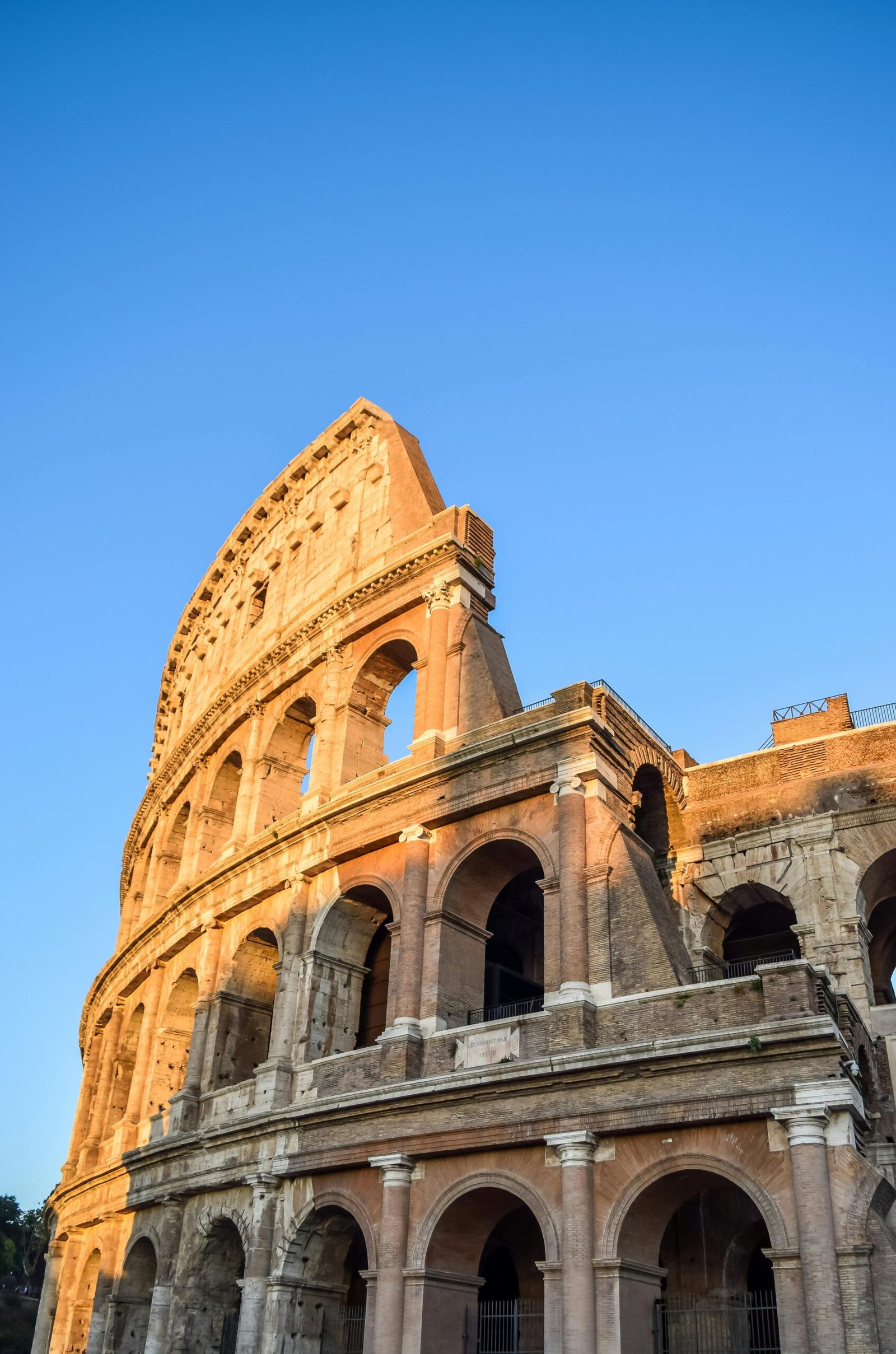 pexels-photo-1701595-1701595 Capture of the iconic Colosseum in Rome with clear blue skies, highlighting its historic architecture.