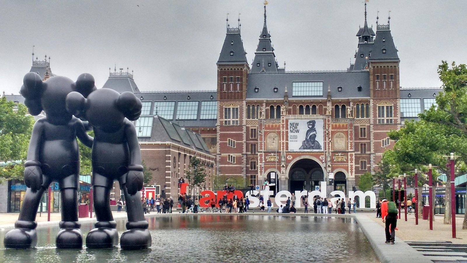 pexels-photo-208733-208733 The Rijksmuseum facade with modern art sculptures and reflection in Amsterdam.