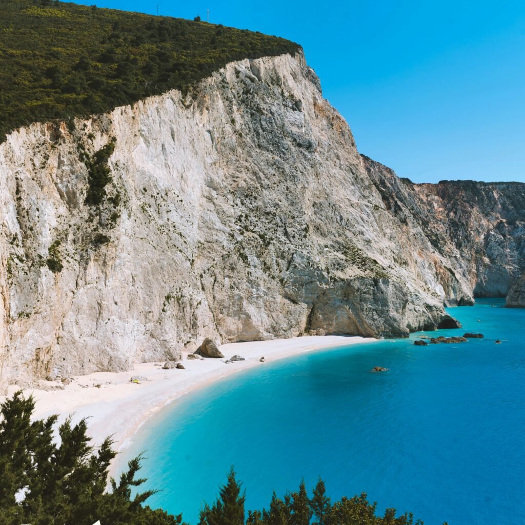 Crystal clear waters and white cliffs at Porto Katsiki beach in Lefkada, Greece.