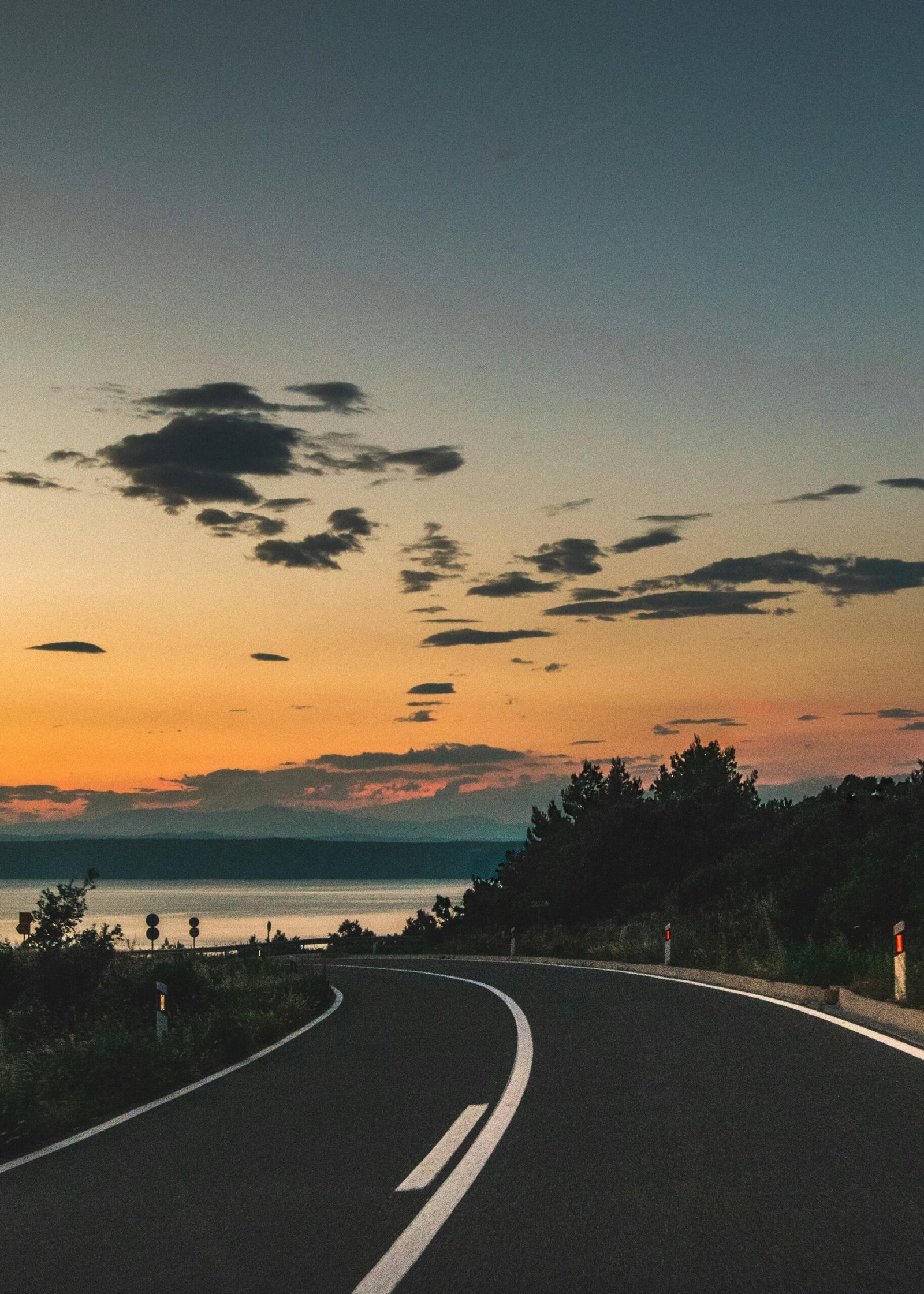 pexels-photo-2389169-2389169 Beautiful curved road with sunset view and ocean in Korčula, Croatia.