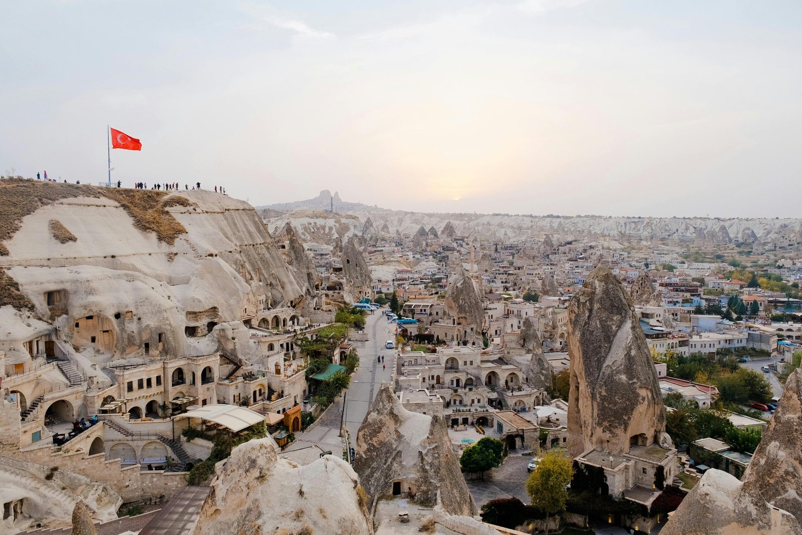 pexels-photo-2563678-2563678 A breathtaking view of Göreme's unique rock formations and cave dwellings at sunrise in Cappadocia, Turkey.