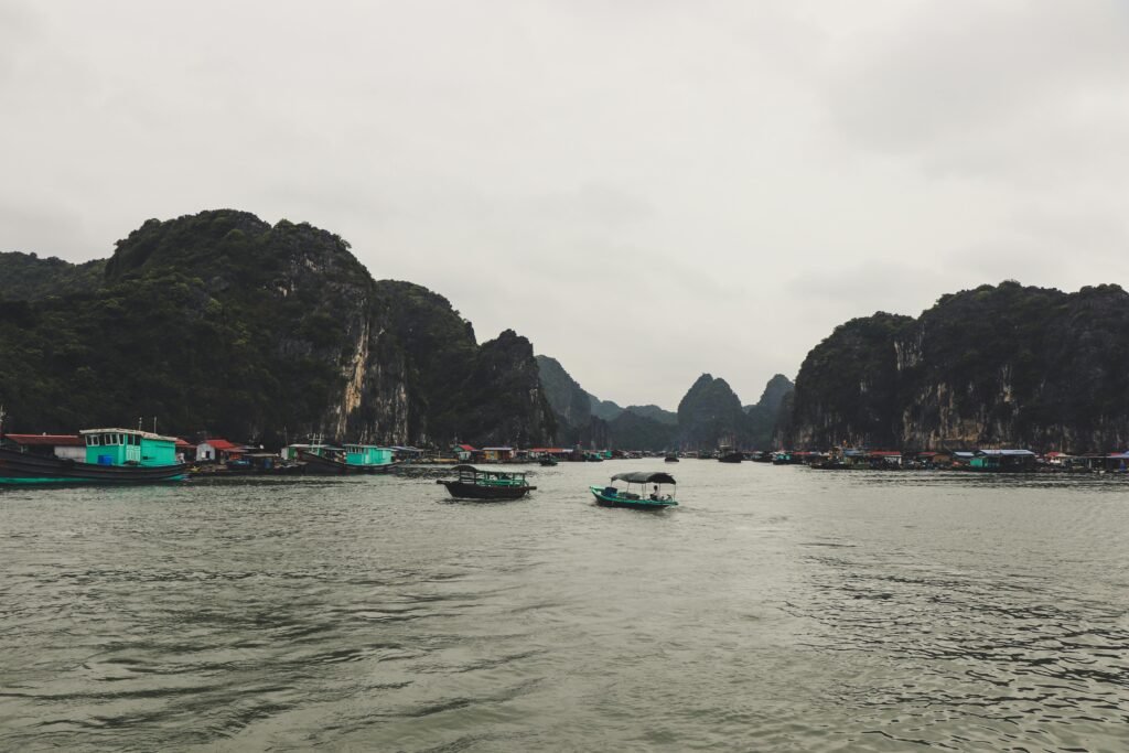 pexels-photo-2984555-2984555 Explore the stunning limestone islands and boats of Hạ Long Bay.