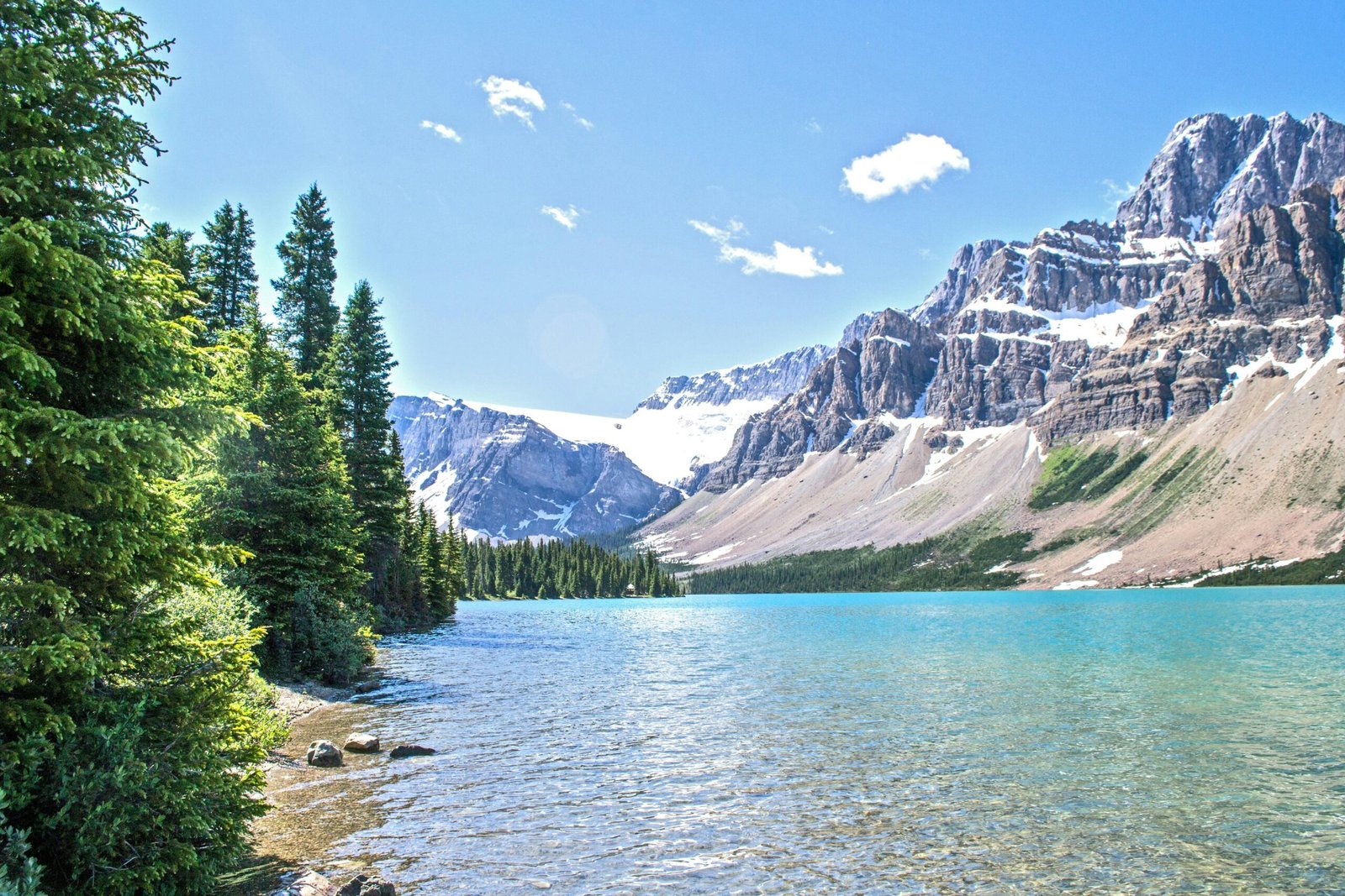 pexels-photo-533769-533769 Stunning view of Bow Lake with rocky mountains and green forests in Banff National Park.