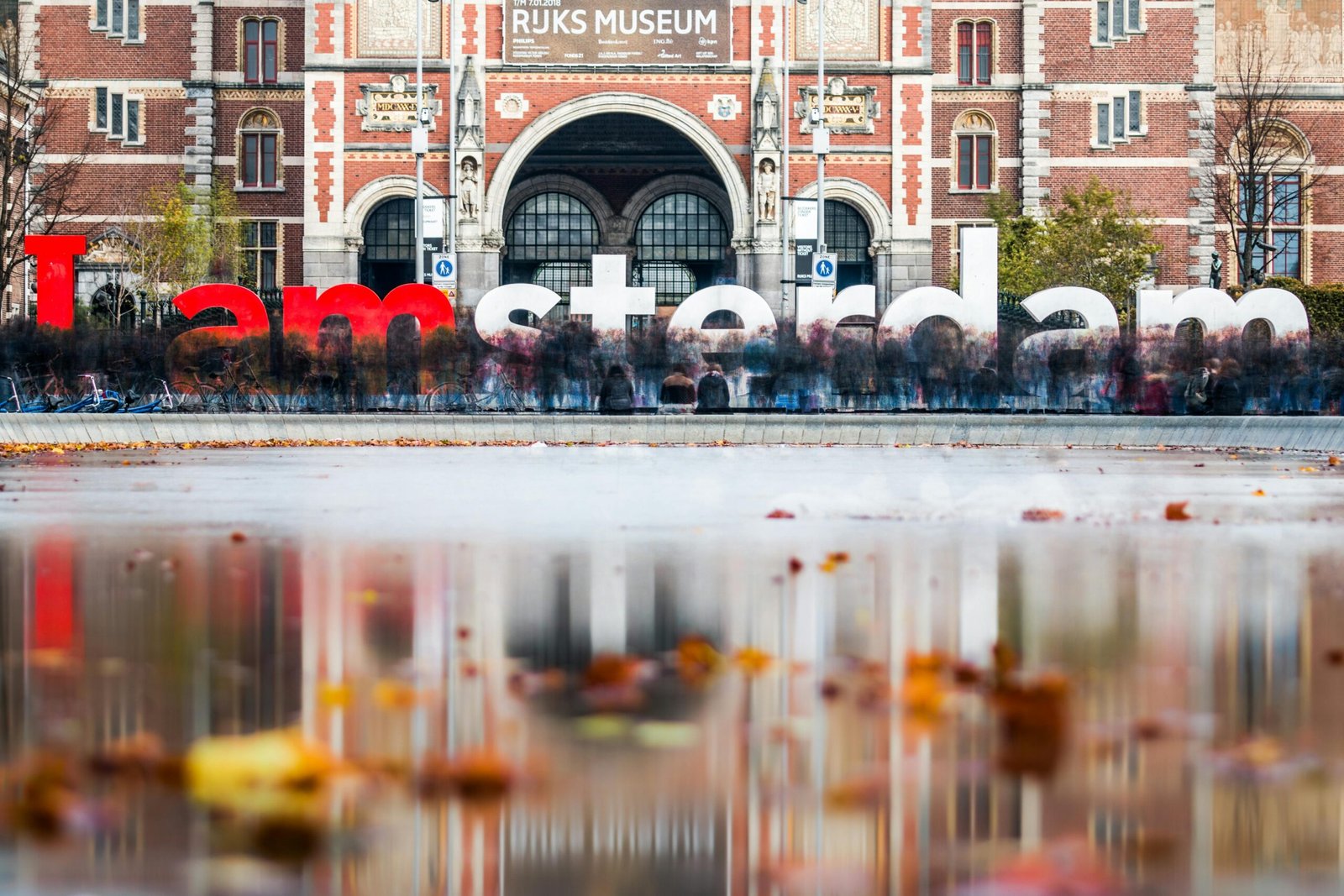 pexels-photo-706416-706416 The famous I amsterdam sign in front of the Rijksmuseum with autumn reflections in the foreground.